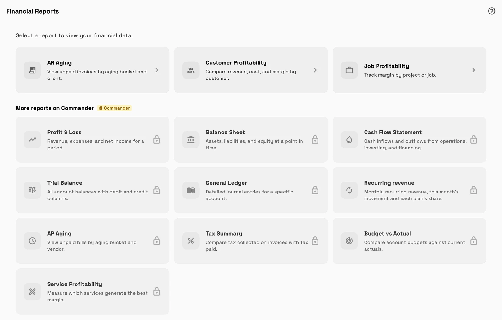 Financial reports on Specialist: AR Aging, Customer Profitability and Job Profitability open, then More reports on Commander with a Commander badge and ten locked reports including Profit & Loss, Balance Sheet, Cash Flow Statement and Tax Summary.